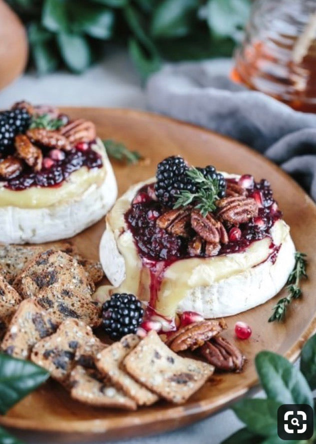BAKED BRIE WITH BLACKBERRY COMPOTE AND SPICY CANDIED PECANS