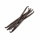 French Guiana Vanilla Beans - The Mana - Grade A Planifolia displayed in a group on a white background.