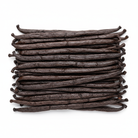 Pile of plump vanilla beans laid horizontally