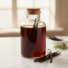 Vanilla extract jar with vanilla beans