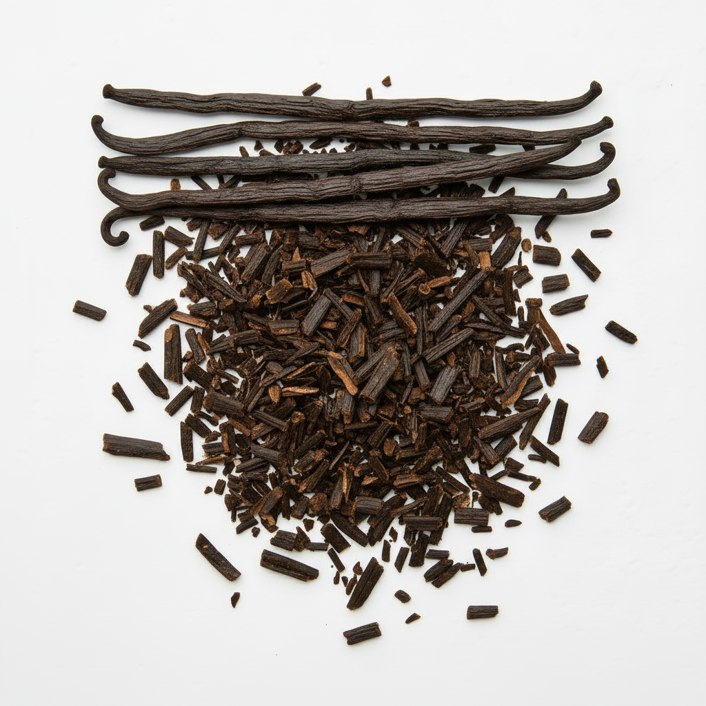 Whole vanilla beans on top of broken pieces
